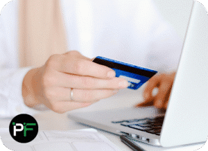 A customer entering card payment details on a computer, illustrating secure transaction processing powered by ecommerce software development.