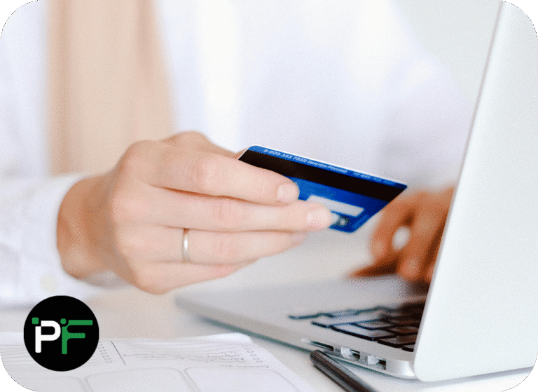 A customer entering card payment details on a computer, illustrating secure transaction processing powered by ecommerce software development.