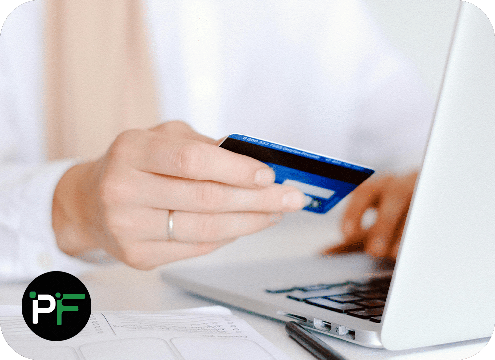 A customer entering card payment details on a computer, illustrating secure transaction processing powered by ecommerce software development.