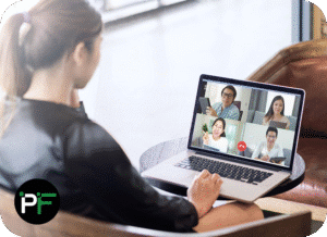 A software consultant engaged in discussion with clients, representing strategic guidance and expertise in software development consulting.