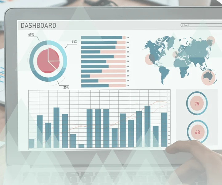 Laptop displaying a reporting dashboard with charts