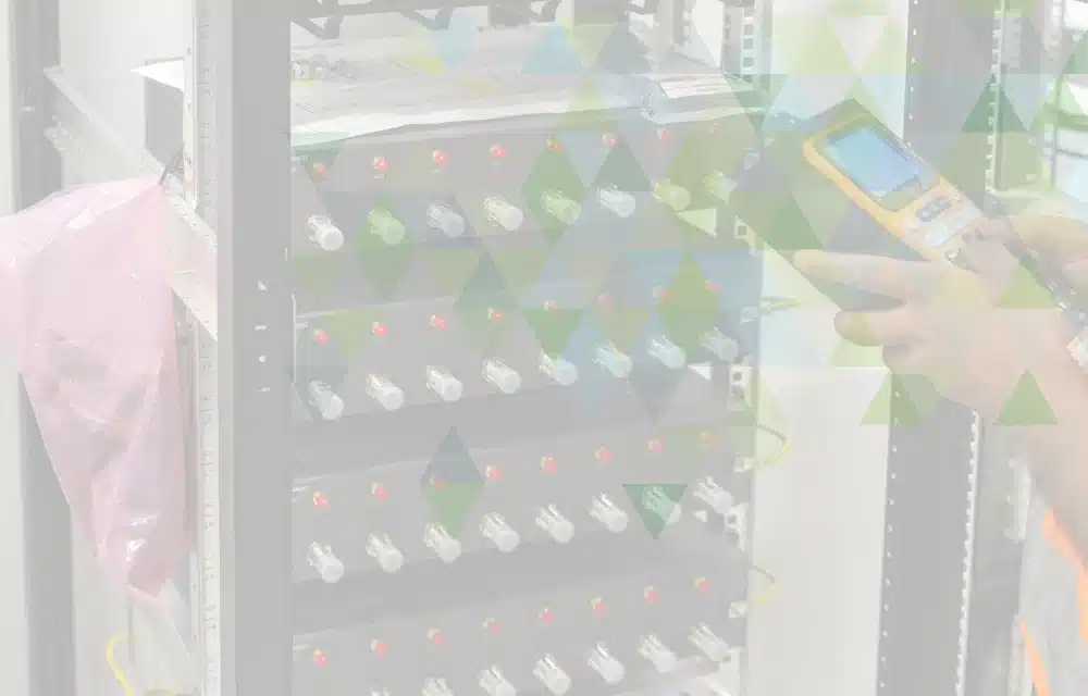 Technician working on a server rack