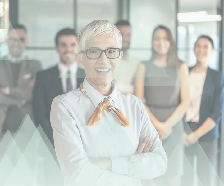 Trust leader standing in front of her central team