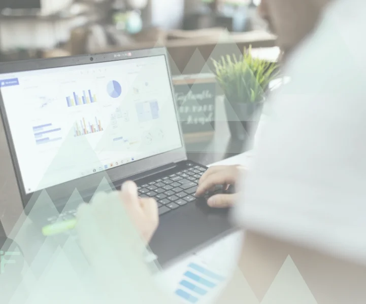 Person reviewing an NHS data dashboard on a laptop